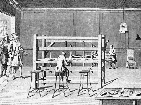 Diamond cutter's shop, eighteenth century, in which the
diamond-cutting mill is operated by man-power." Published in the
Universal Magazine of Knowledge and Pleasure, by John Hinton, England,
July, 1749