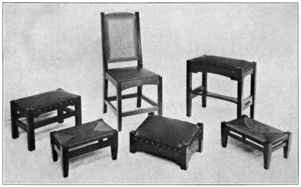 Five stools of different design and a chair